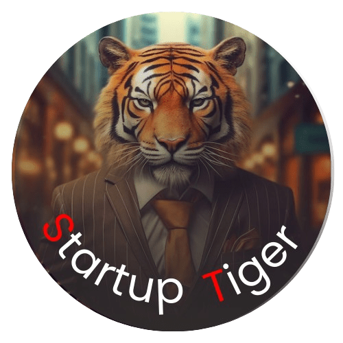 Logo of Startup Tiger initiative featuring the words 'Startup India' in bold, colorful typography with an upward arrow integrated into the design, symbolising growth and innovation. The background is white, emphasizing the vibrant colors of the logo